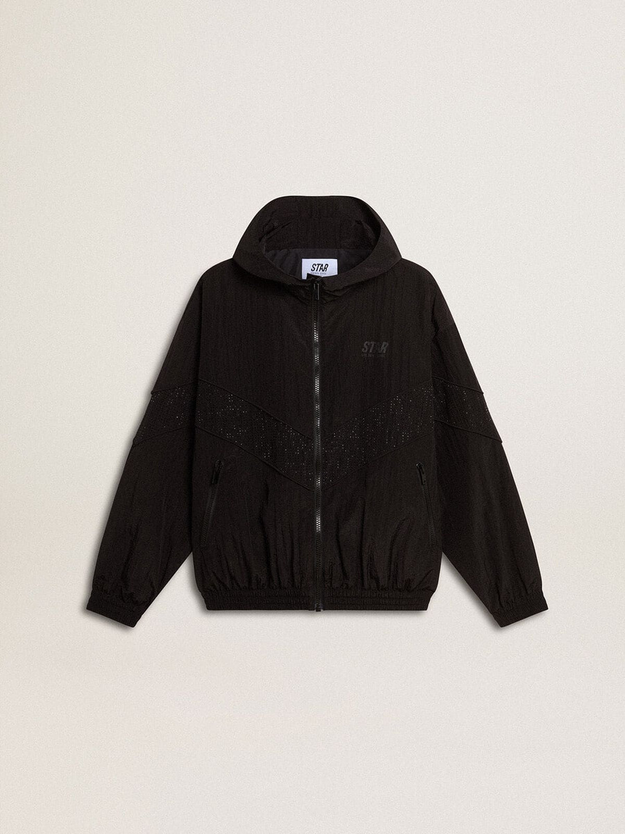 dameswindjack van zwart nylon met kristallen in dezelfde kleur.