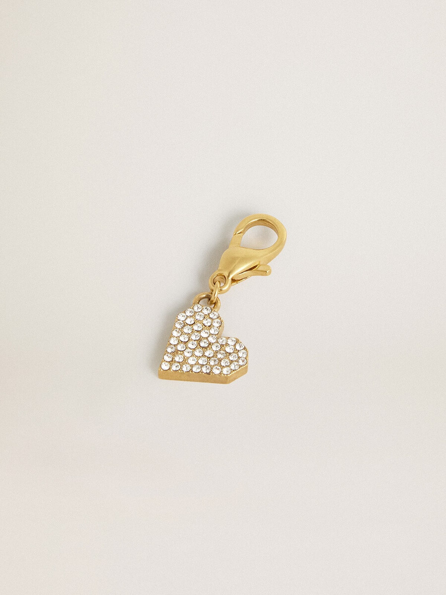 hartvormige hanger van goudkleurig messing met kristallen.