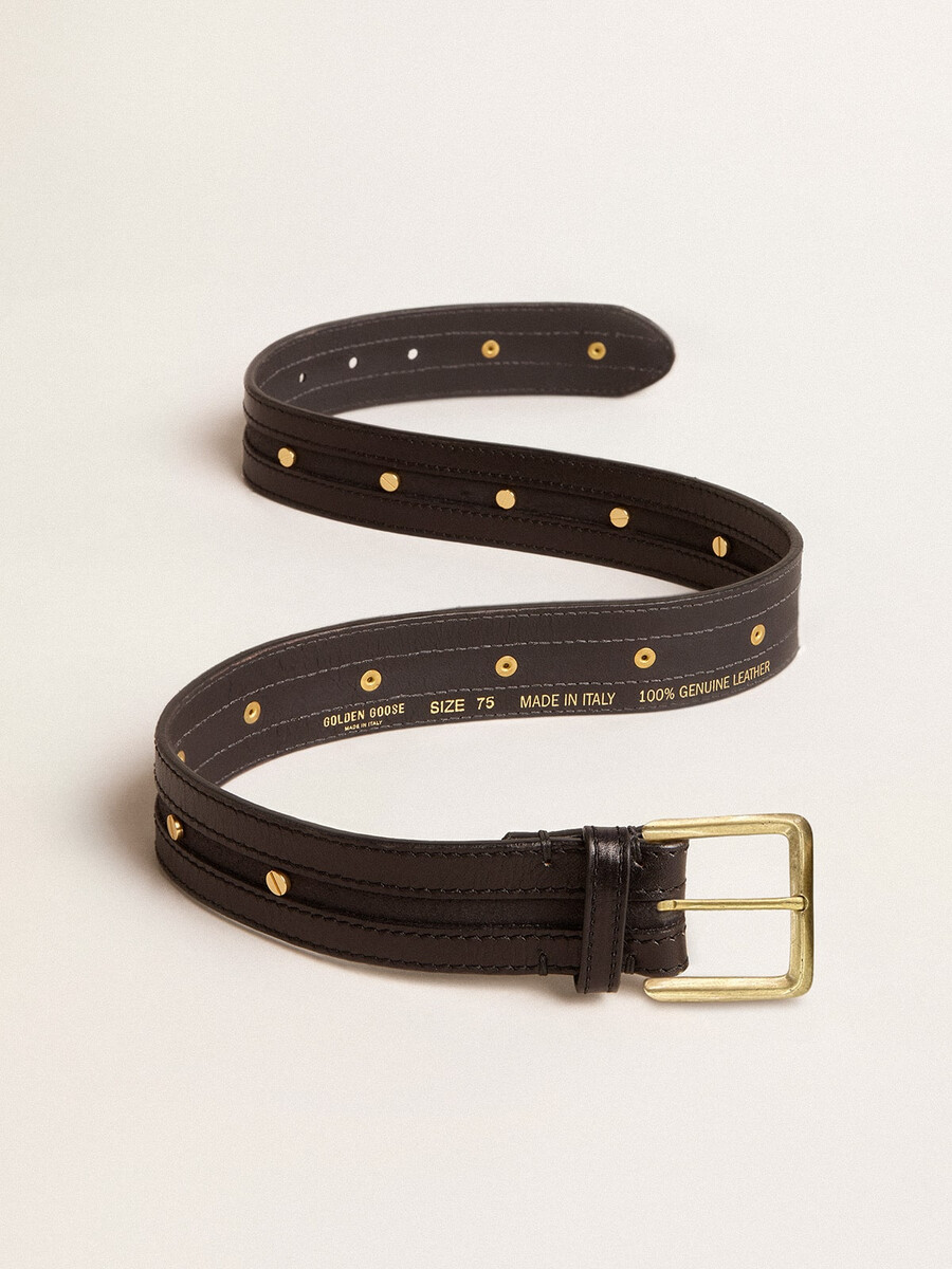 damesriem in zwart gewassen leer met gouden studs.