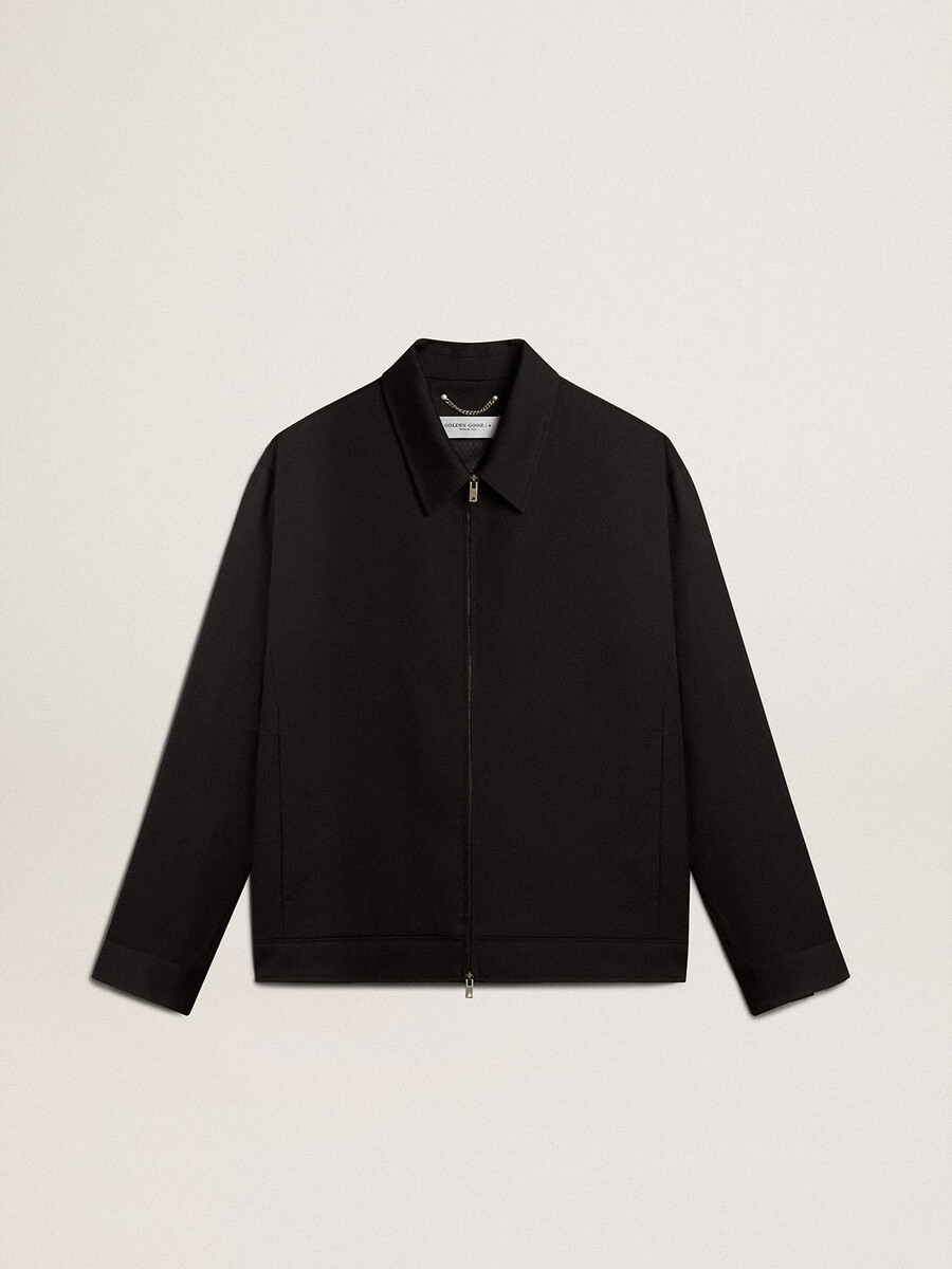 herenjas met ritssluiting van zwarte wollen gabardine.
