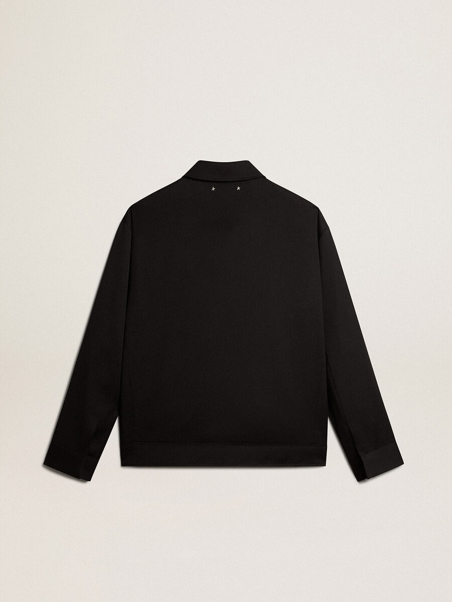 herenjas met ritssluiting van zwarte wollen gabardine.