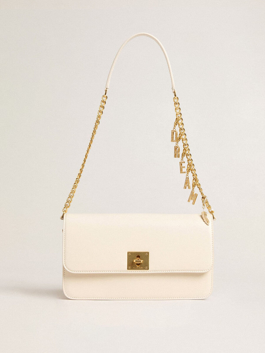 gioia-tas van boterkleurig geribbeld leer met gouden details.
