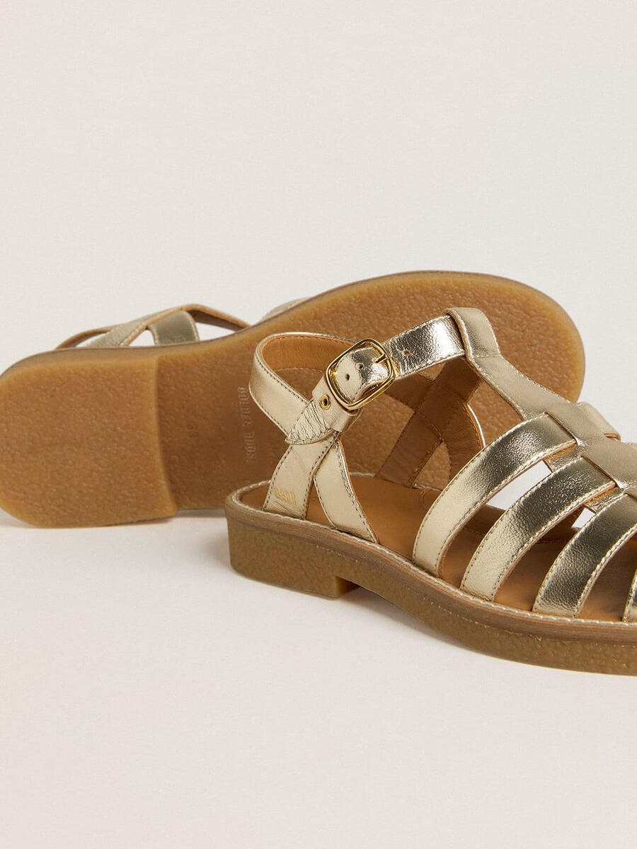 maxime young sandalen van goudkleurig leer.