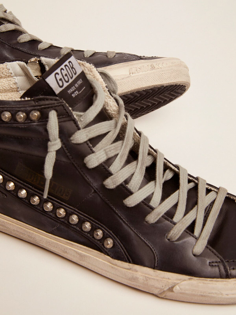 herenslippers zwart met studs