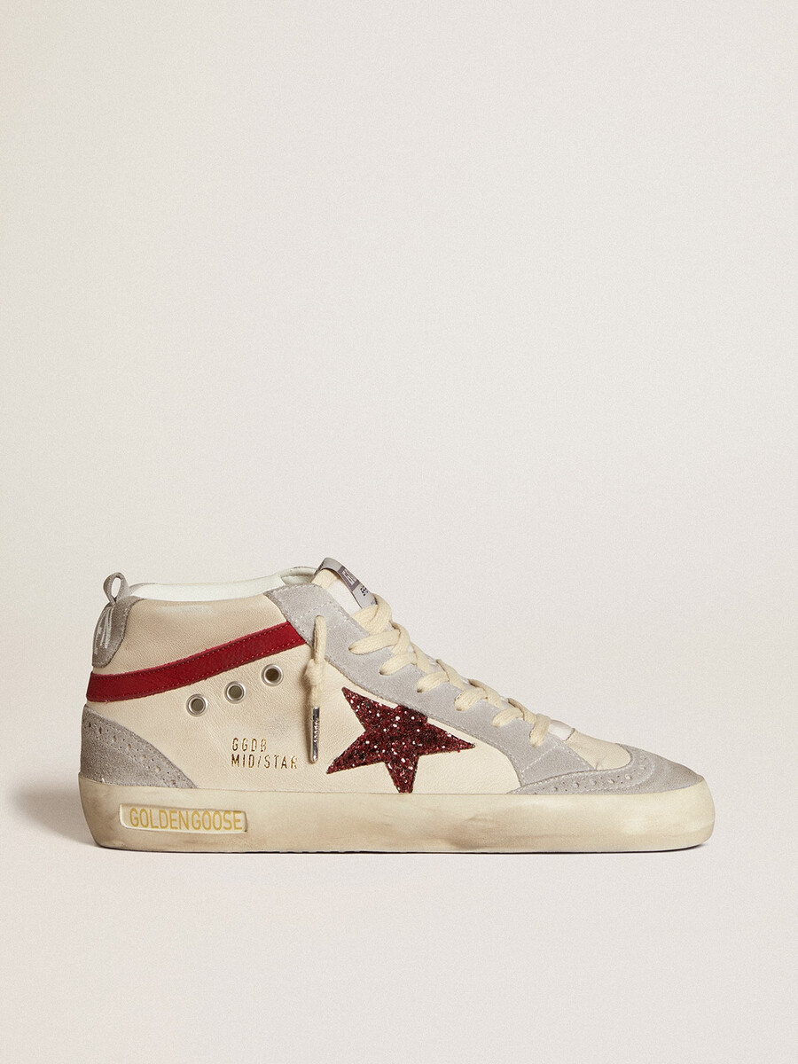 dames mid star in leer met glitterster en rode nubuck accenten.