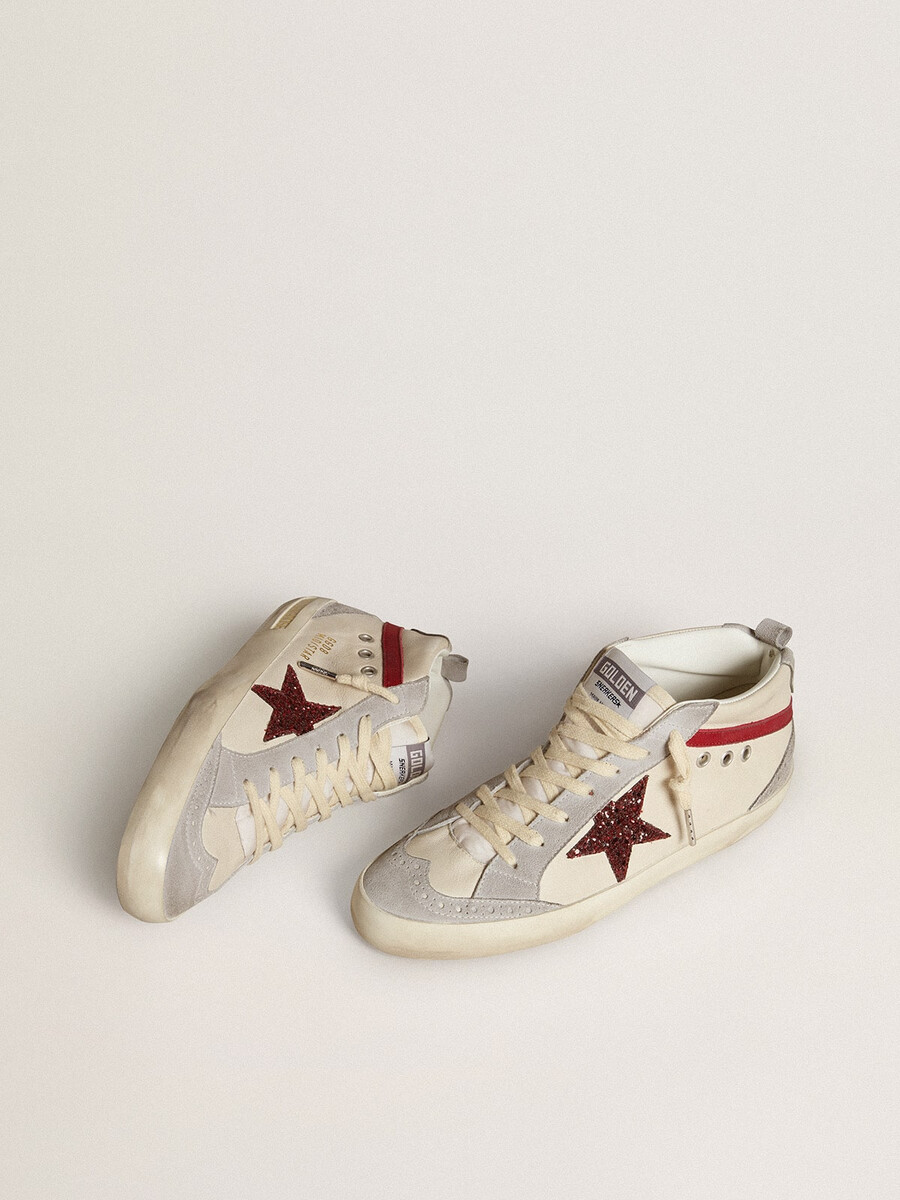 dames mid star in leer met glitterster en rode nubuck accenten.