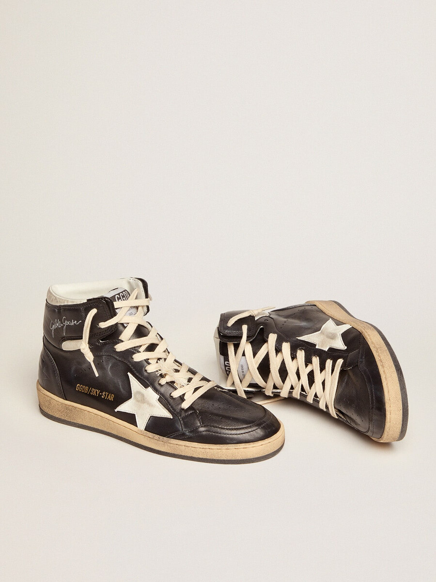 dames sky-star in zwart nappaleer met witte ster
