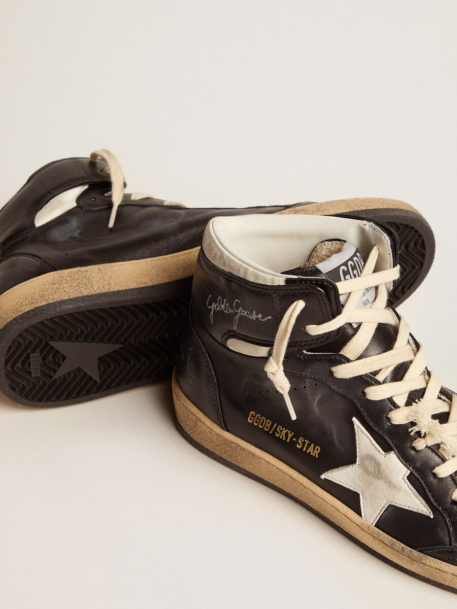 dames sky-star in zwart nappaleer met witte ster