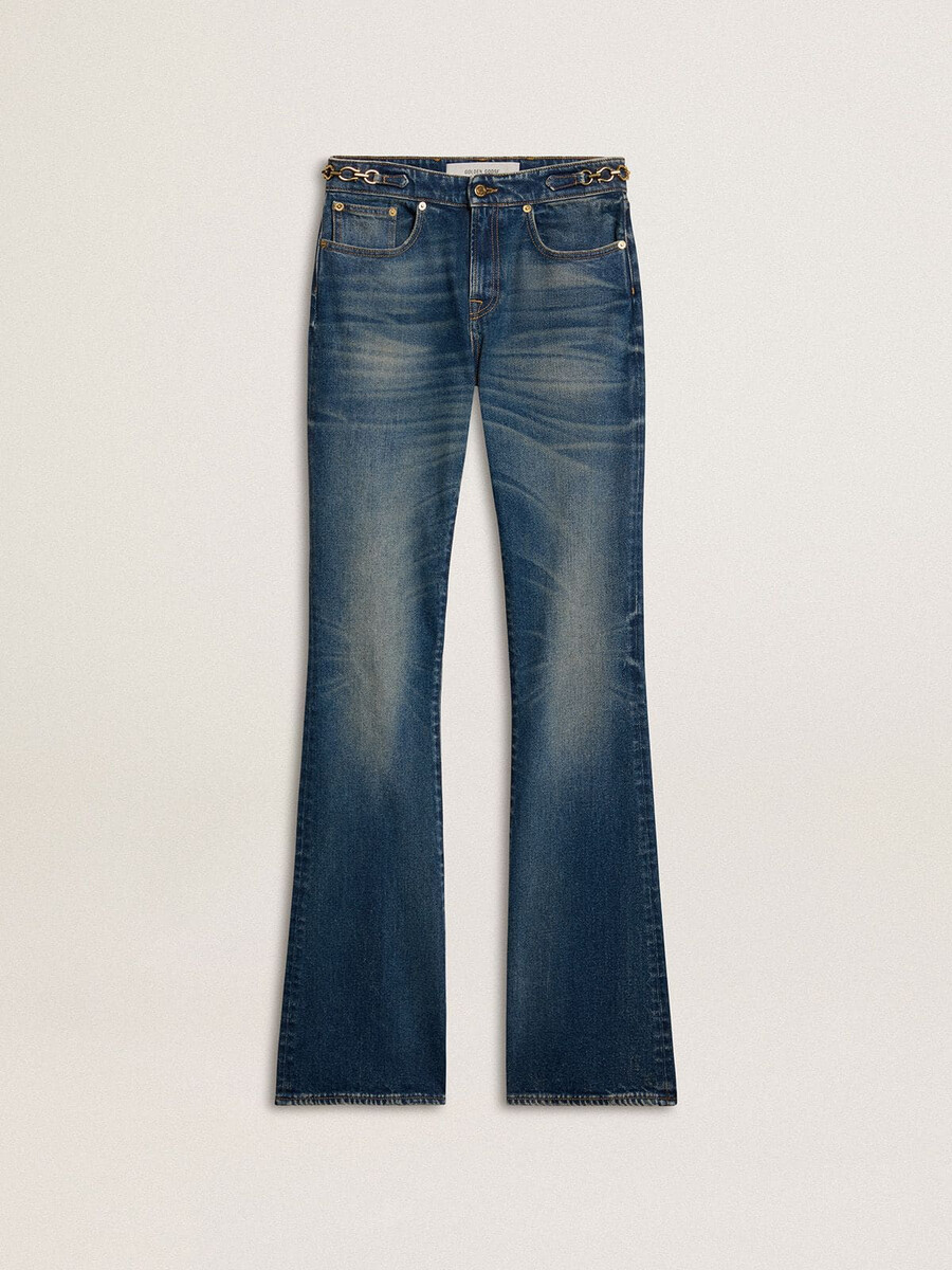 damesjeans met bootcut model vintage wassing en metallic details.