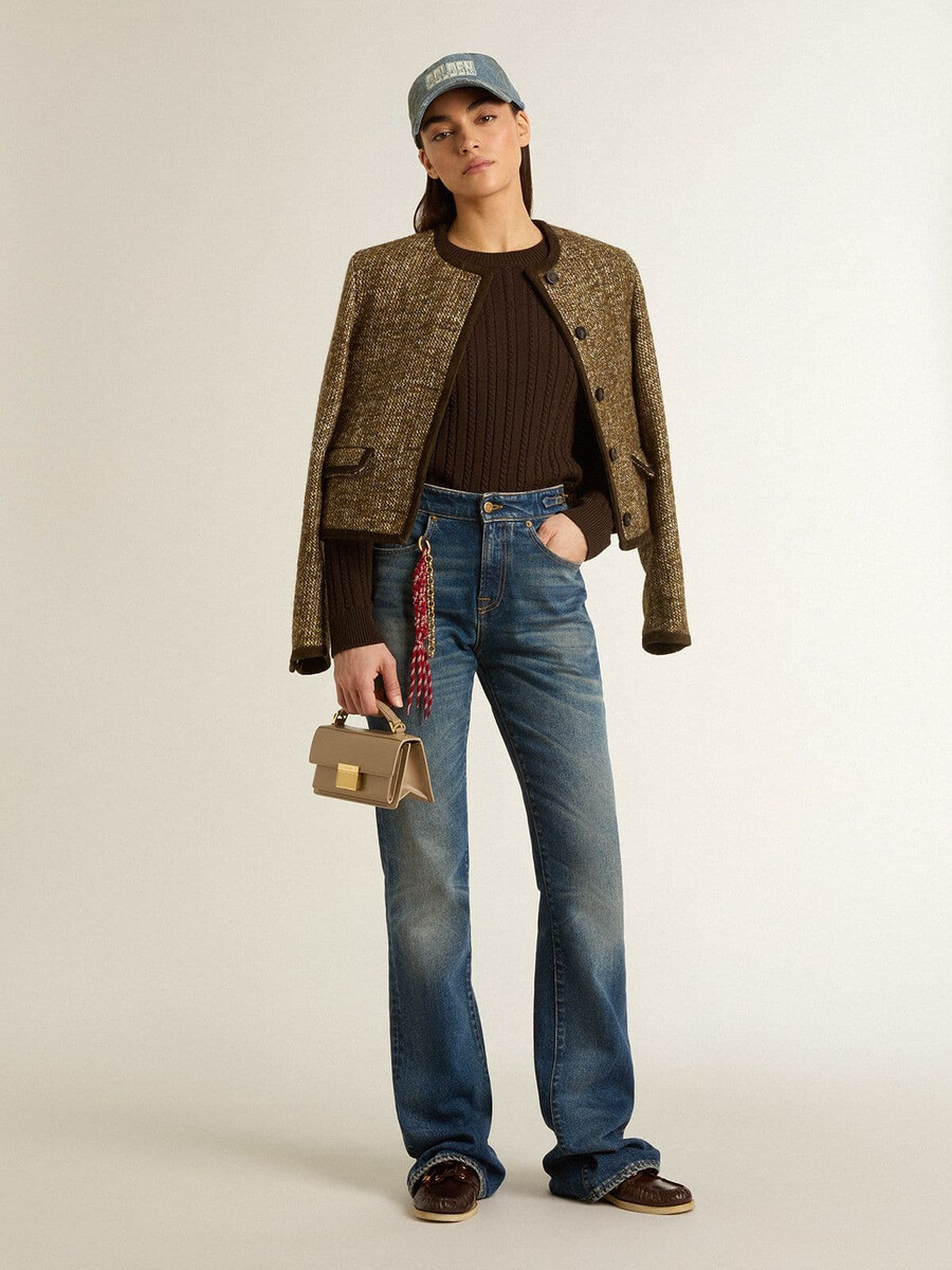 damesjeans met bootcut model vintage wassing en metallic details.