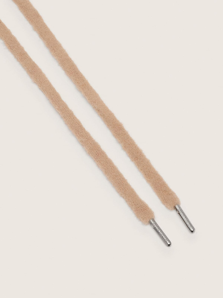 beige pluizige veters
