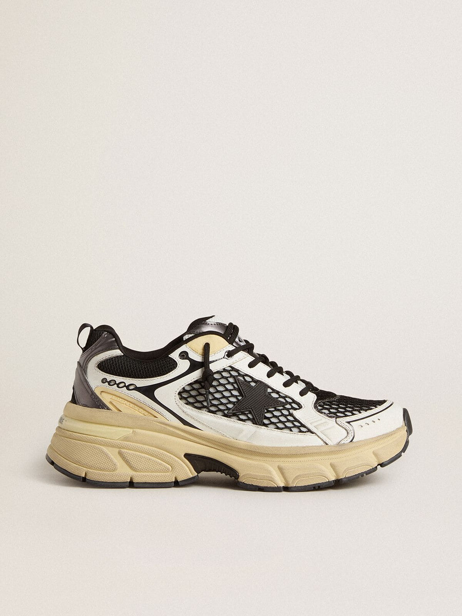 dames lightstar in wit leer en zwart mesh met zwarte tpu-ster