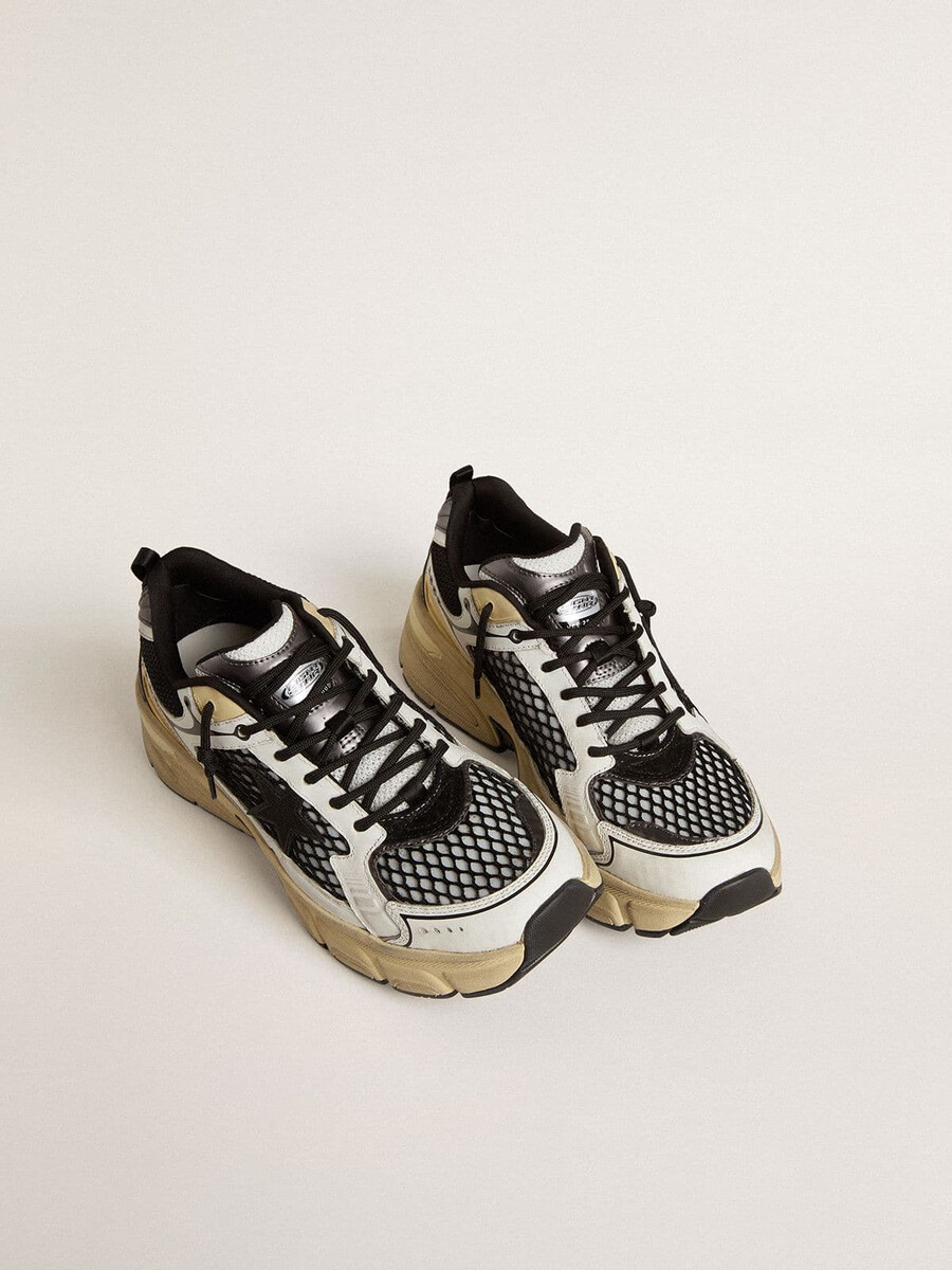 dames lightstar in wit leer en zwart mesh met zwarte tpu-ster
