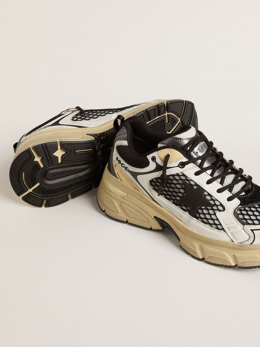 dames lightstar in wit leer en zwart mesh met zwarte tpu-ster