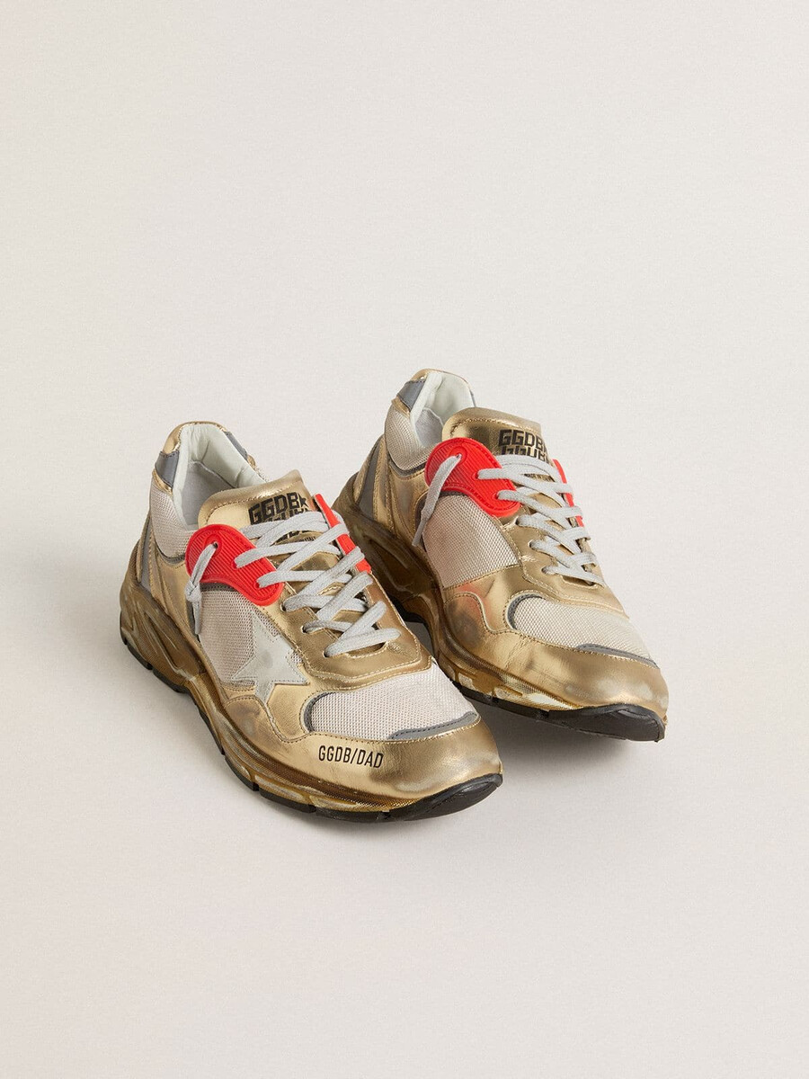 heren dad-star van mesh en goudkleurig leer met witte leren ster.