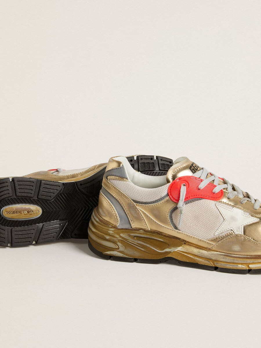 heren dad-star van mesh en goudkleurig leer met witte leren ster.