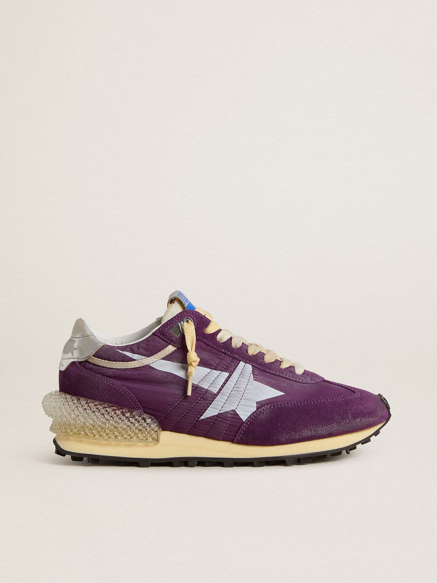 damesmarathon met paars nylon bovenwerk en witte ster