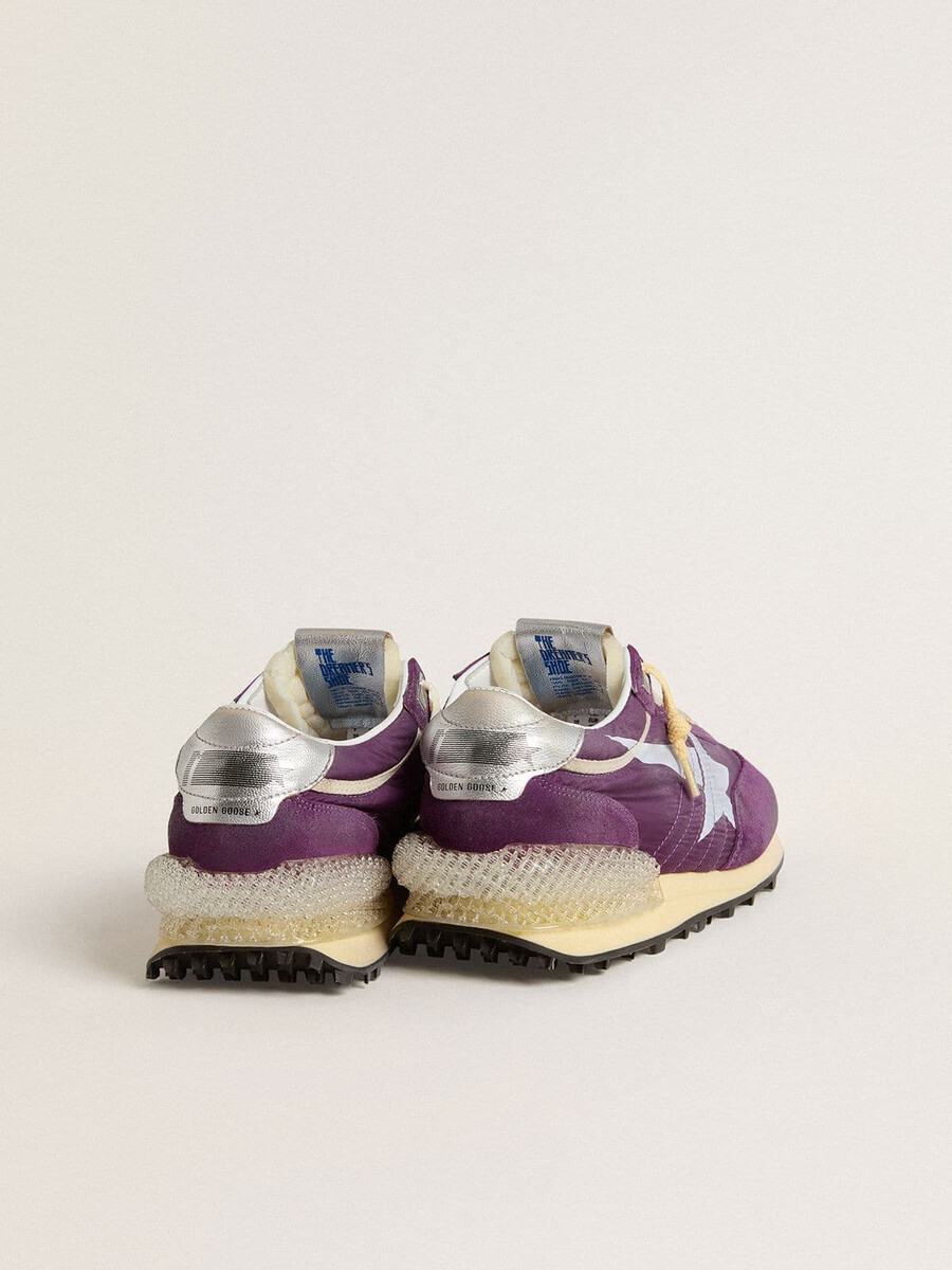 damesmarathon met paars nylon bovenwerk en witte ster