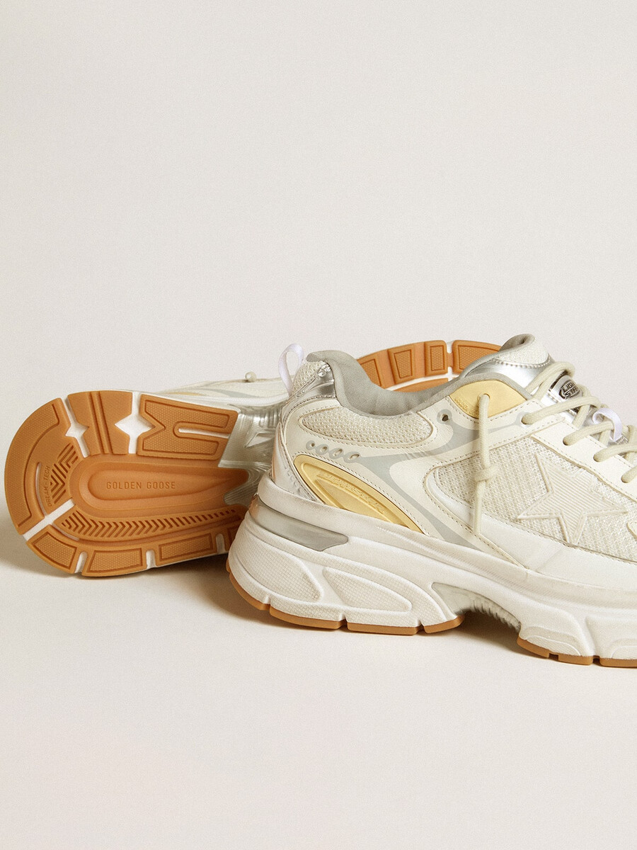 dames lightstar in wit leer en mesh met een versleten witte ster.
