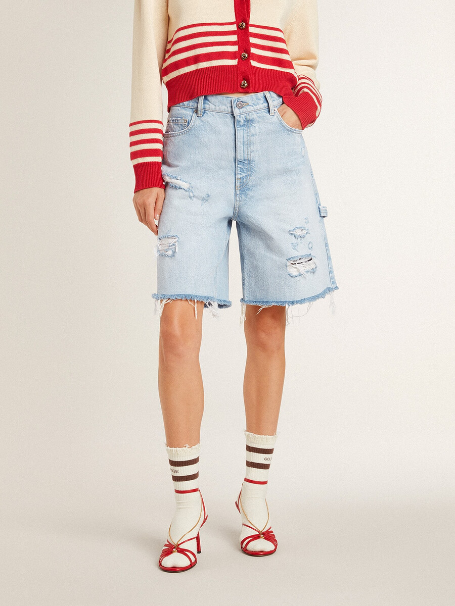 damesbermudashorts van denim met een gedragen look.