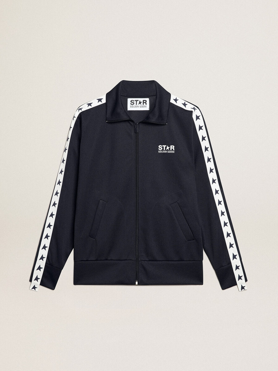 donkerblauwe sweater met rits witte streep en contrasterende sterren.