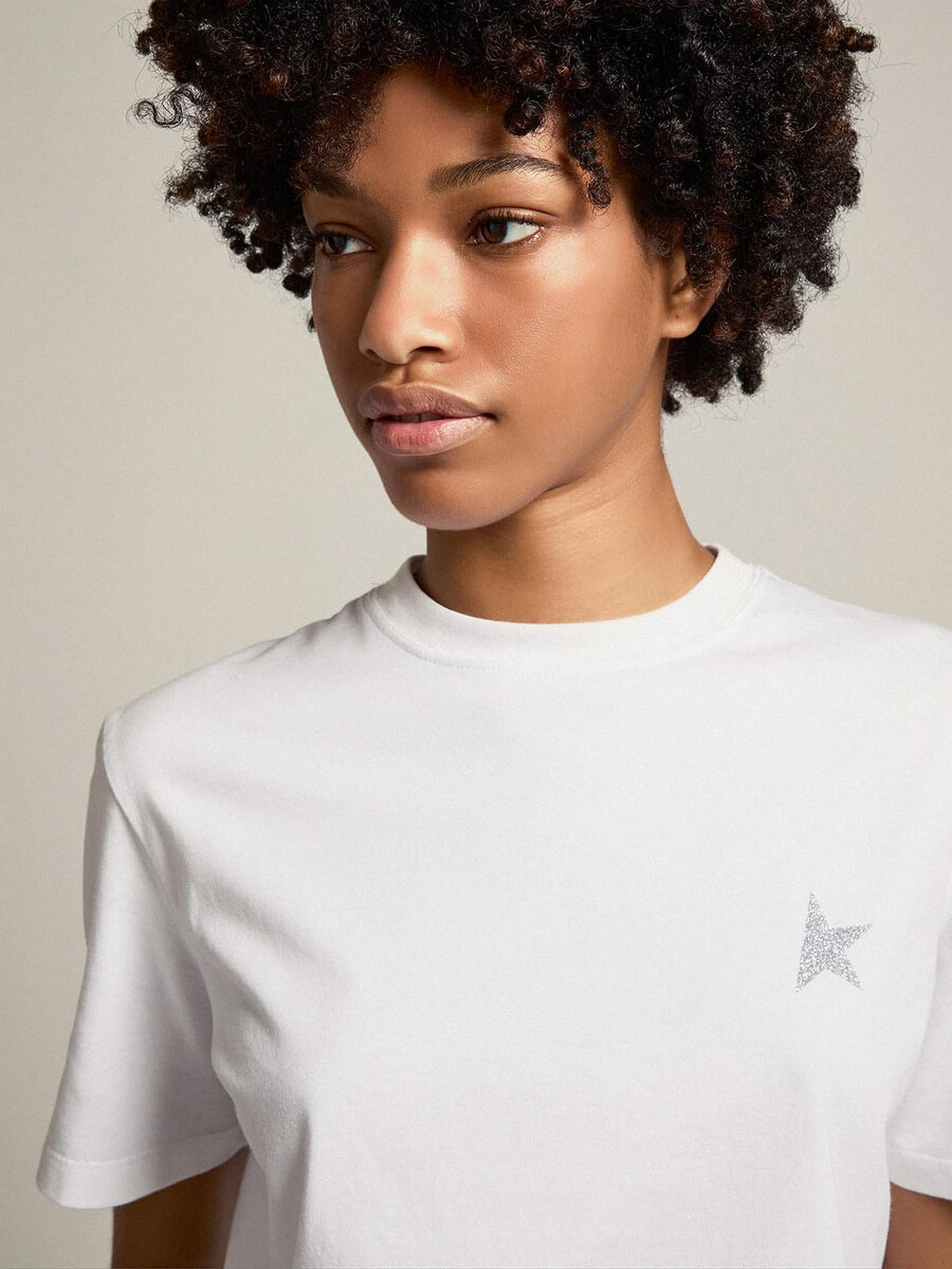 wit dames-t-shirt met zilveren glitterster op de voorkant