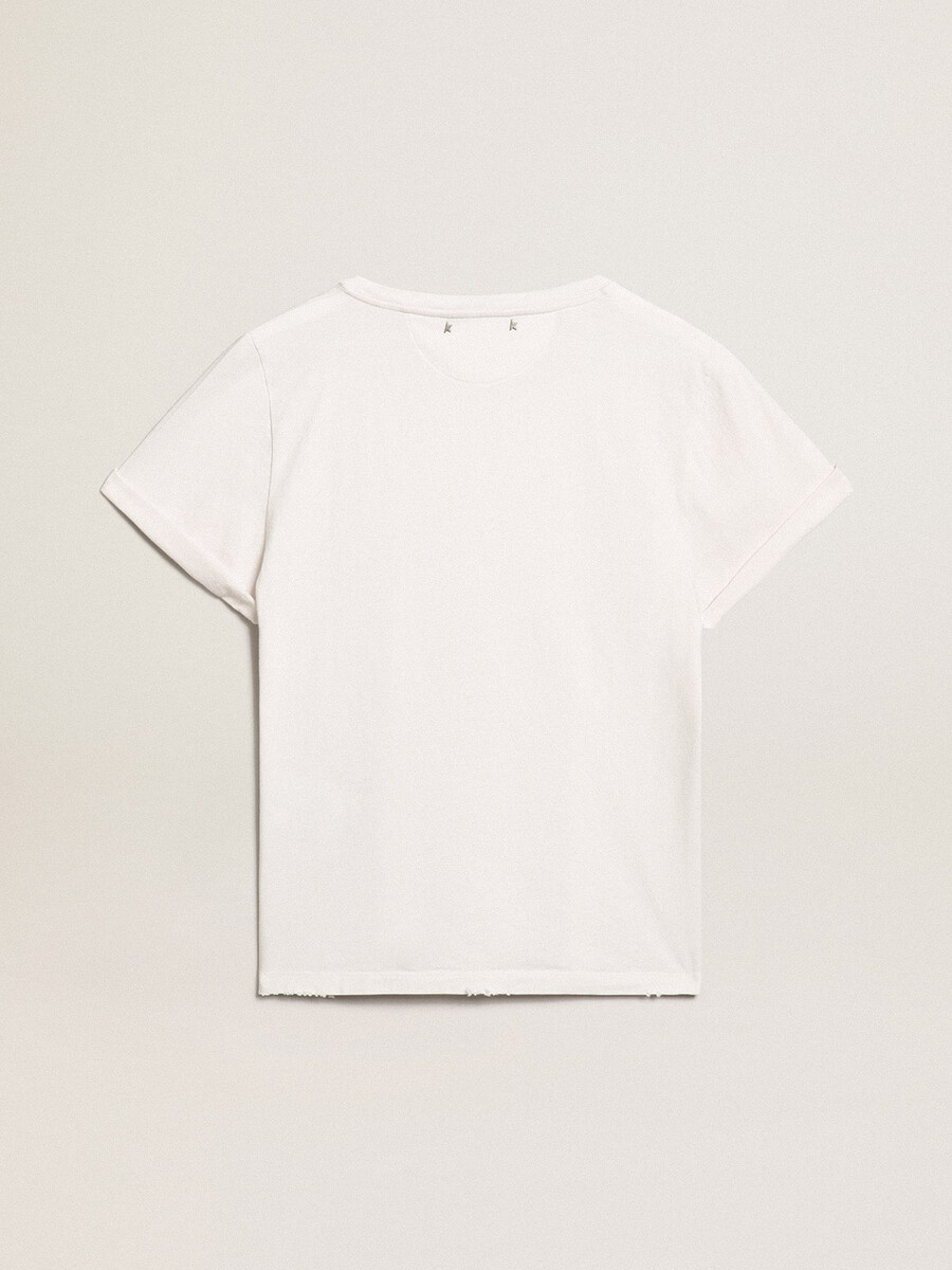getailleerd dames-t-shirt met een verwassen look in wit.