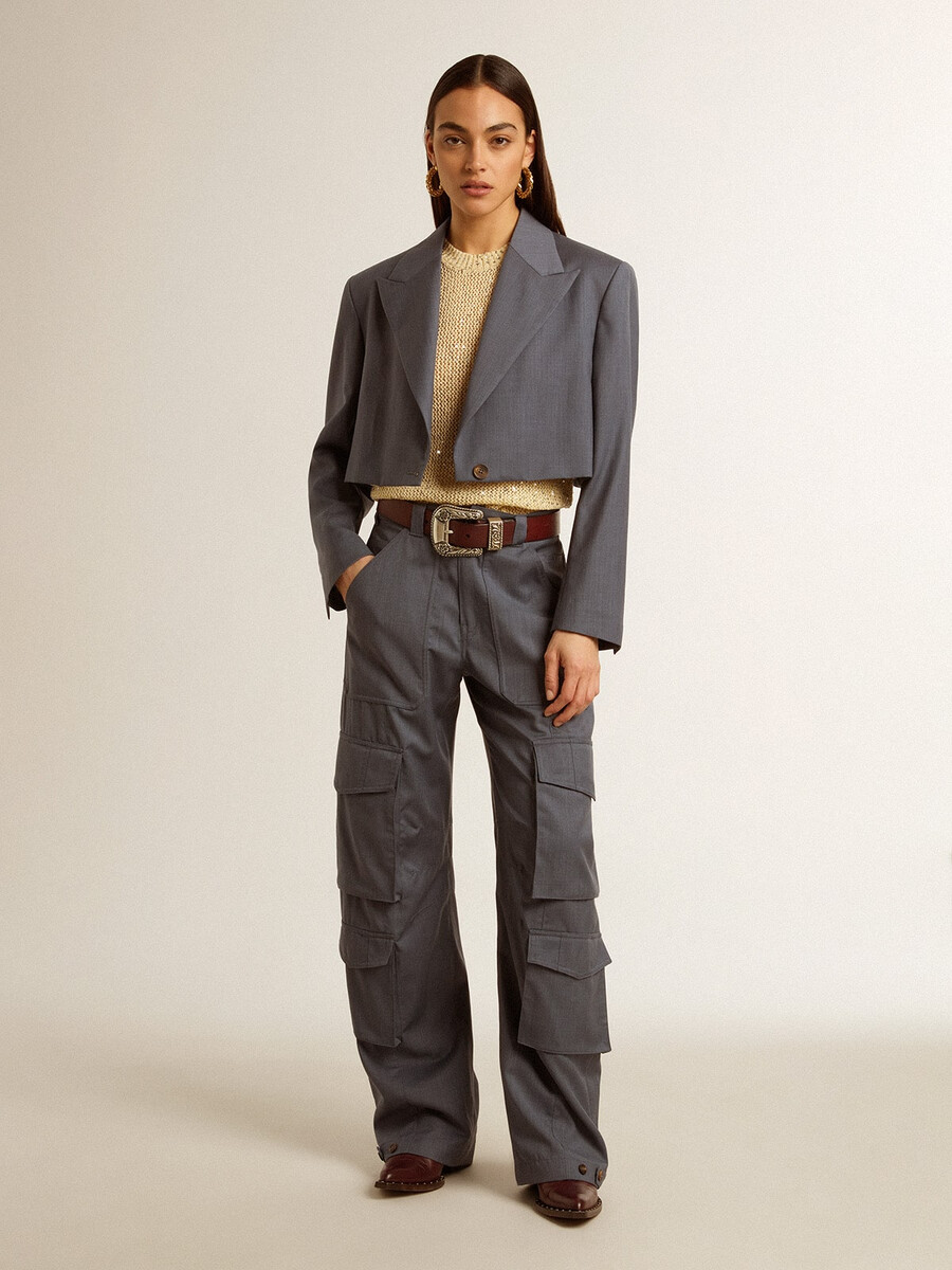 top van mesh-breisel met pailletten en contrasterende details.