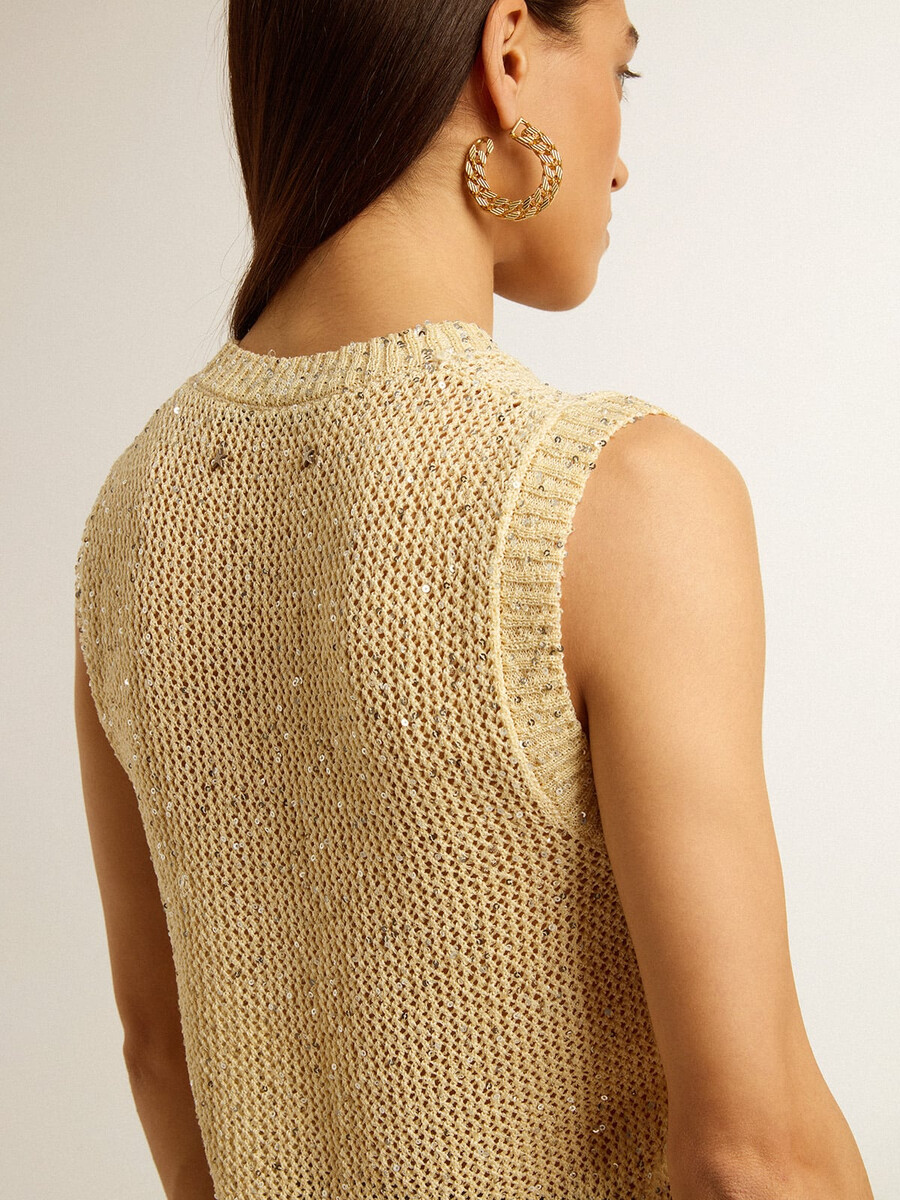 top van mesh-breisel met pailletten en contrasterende details.