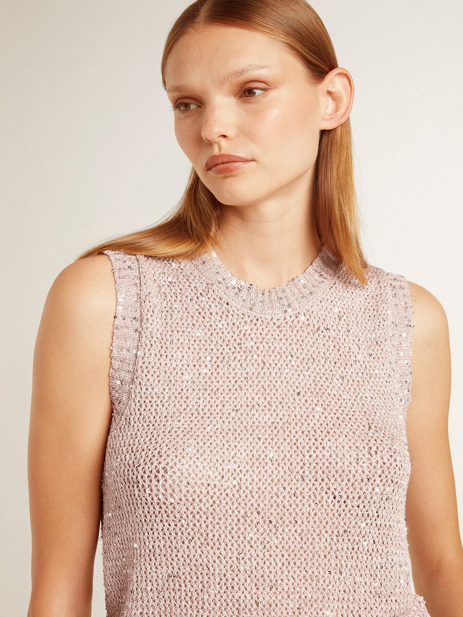 top van mesh-breisel met pailletten en contrasterende details.
