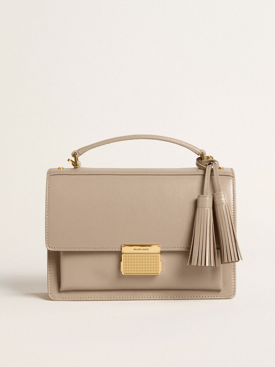 venezia-tas van beige geribbeld leer met gouden details.